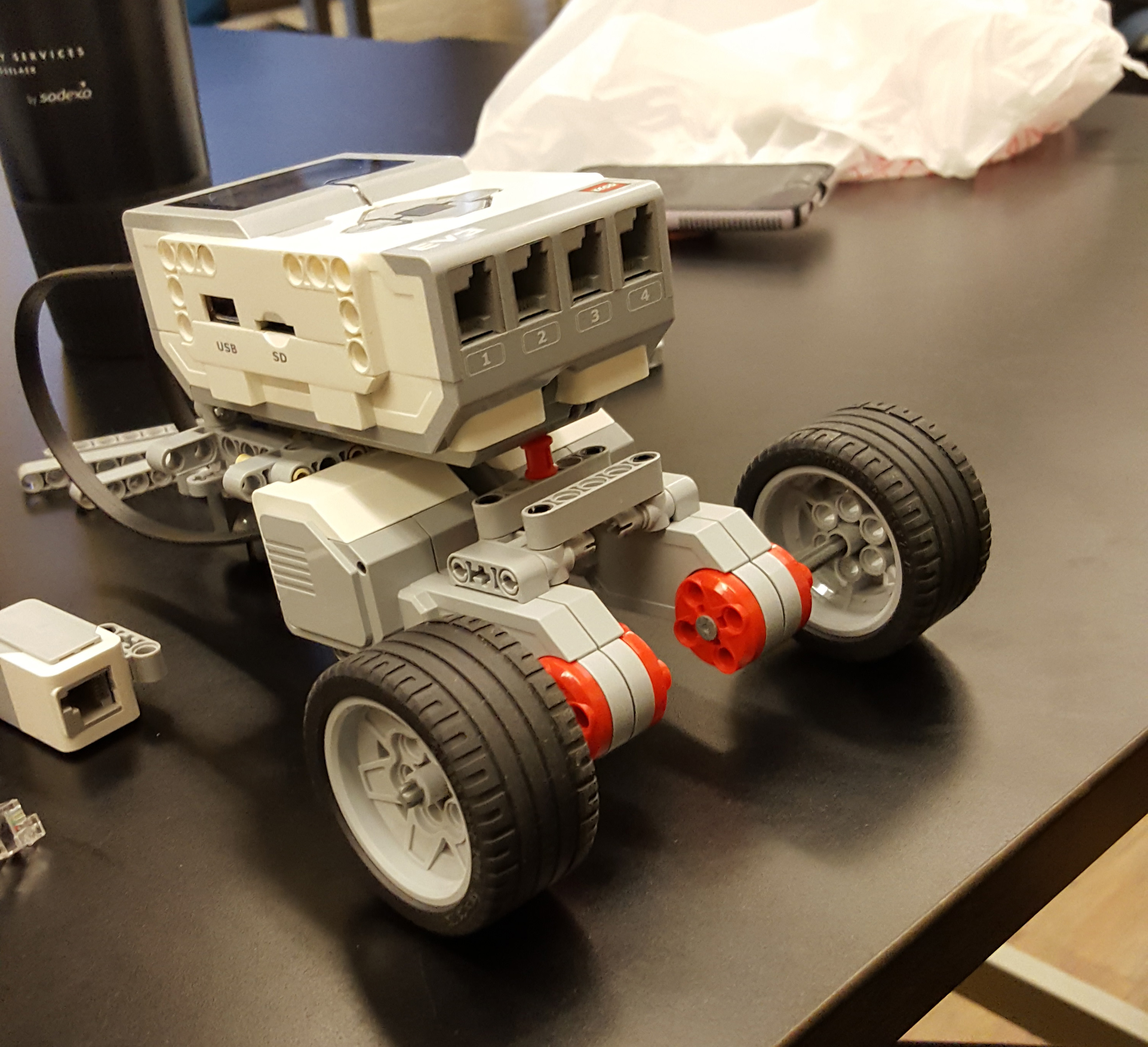 The leggo robot, his name is saggy boi (he was better programmed than built)